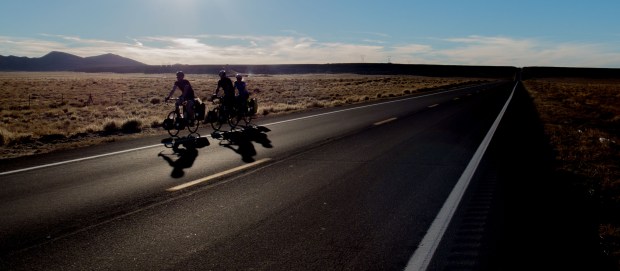 Racing to reach the next store to refuel before the sun disappears. Really tough day into an arduous headwind. Red Mesa, AZ, USA
